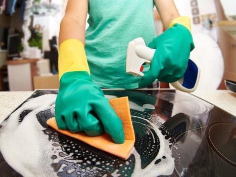 Professional window cleaning equipment used on SW14 property